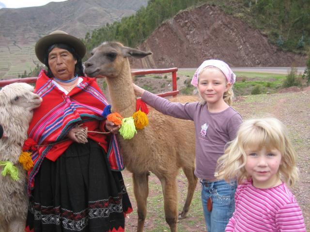kids with alpacas